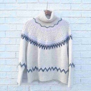 Cozy White and Blue Patterned Turtleneck Sweater